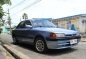 Selling Blue Mazda 323 in Las Piñas-1