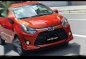 Orange Toyota Wigo for sale in Quezon City-0