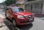 Selling Red Chevrolet Captiva in San Juan-0