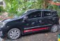 Selling Black Toyota Wigo 2014 in Cabuyao-1
