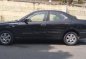 Black Nissan Sentra for sale in Esteban Abada -2