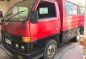 Red Isuzu Elf for sale in Manila-0