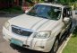 Selling Pearl White Mazda Tribute in Pasig-1