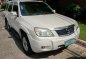 Selling Pearl White Mazda Tribute in Pasig-9