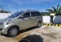 Selling Gold Toyota Avanza 2013 Van in Cavite City-0