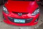 Red Mazda 2 for sale in Cebu City-0