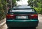Green Mazda Protege for sale in Buenavista-4