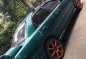 Green Mazda Protege for sale in Buenavista-3