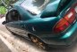 Green Mazda Protege for sale in Buenavista-1