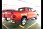 Orange Toyota Hilux 2018 at 27364 km for sale in Manila-5