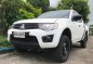 Sell Pearl White 2014 Mitsubishi Strada in Manila-0