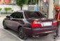 Red Mitsubishi Lancer 2000 Sedan at 113000 km for sale in Manila-6