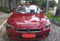 Red Mitsubishi Lancer 2013 for sale in Quezon City-0