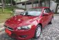 Red Mitsubishi Lancer 2013 for sale in Quezon City-1