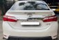 Selling Pearl White Toyota Corolla Altis 2016 in Angat-2