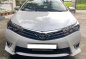 Selling Pearl White Toyota Corolla Altis 2016 in Angat-0