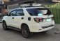 Pearl White Toyota Fortuner 2015 for sale in Orani-1
