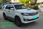 Pearl White Toyota Fortuner 2015 for sale in Orani-0