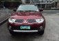 Red Mitsubishi Montero Sport 2013 for sale in Makati City-0