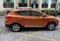 Orange Hyundai Tucson 2013 for sale in Cainta-0