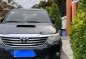 Selling Black Toyota Fortuner 2014 in Davao-0