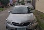 Selling Brightsilver Toyota Corolla Altis 2012 in Quezon-1