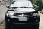 Black Mitsubishi Strada 2012 for sale in Quezon-0