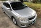 Brightsilver Toyota Corolla Altis 2010 for sale in Quezon-0