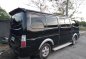 Black Nissan Urvan 2003 Van for sale in Santa Teresita-1