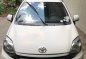 Pearl White Toyota Wigo 2015 for sale in San Mateo-0