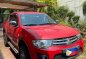 Selling Red Mitsubishi Strada 2013 in Quezon-0