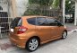 Orange Honda Jazz 2012 for sale in Manila-5
