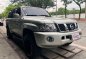 Pearl White Nissan Patrol 2007-9