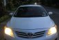 Pearl White Toyota Corolla Altis 2011-9