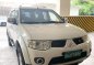 Pearl White Mitsubishi Montero 2013 -1