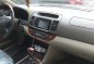 Silver Toyota Camry 2004 for sale in Cavite-1