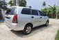 Selling Brightsilver Toyota Innova 2006 in Cavite-9