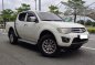 Selling White Mitsubishi Strada 2012 in Makati-0