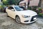 Selling Pearl White Mitsubishi Lancer 2010 in Quezon City-0