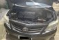 Selling Black Toyota Corolla Altis 2011 in Kalayaan-9