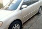 Selling Pearl White Toyota Corolla 2002 in Cainta-1