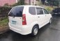 Selling White Toyota Avanza 2010 in Quezon-3