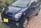 Blue Toyota Wigo 2015 for sale in Tarlac-1