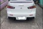 Pearl White Mitsubishi Lancer 2010 for sale in Quezon City-9