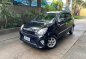 Selling Black Toyota Wigo 2015 in Quezon-0