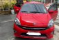 Selling Red Toyota Wigo 2016 in Quezon City-0