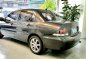 Selling Greyblack Mitsubishi Lancer 2011 in Quezon City-5