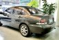 Selling Greyblack Mitsubishi Lancer 2011 in Quezon City-4