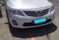 Pearl White Toyota Corolla Altis 2013 for sale in Silang-0