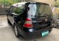 Sell Black 2011 Nissan Grand Livina in Pasay-2